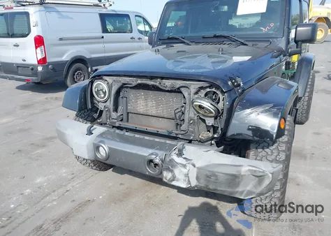 2015 Jeep Wrangler Freedom Edition from USA, damaged, VIN 1C4AJWAG1FL594007